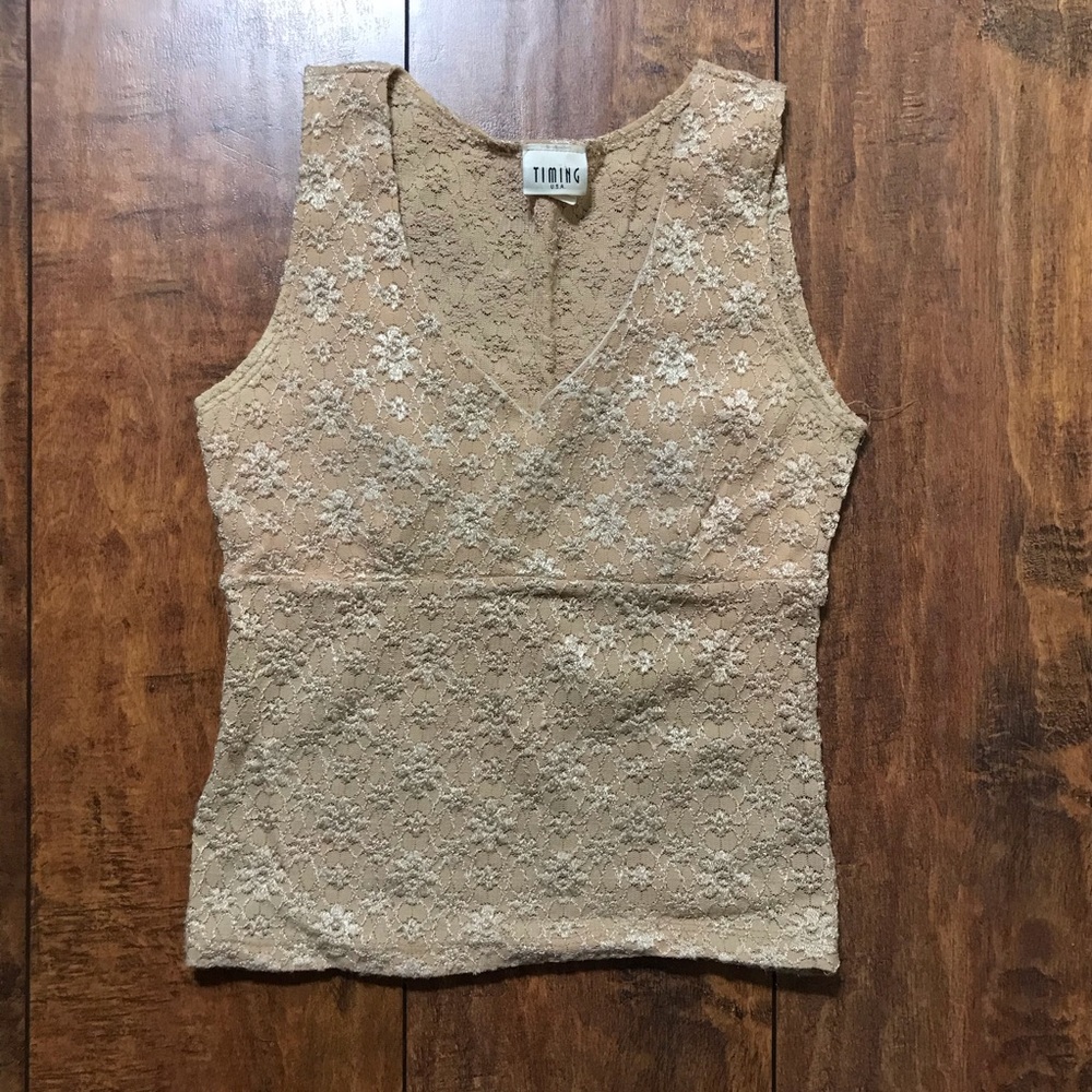 Tan v-neck tank with flower detail